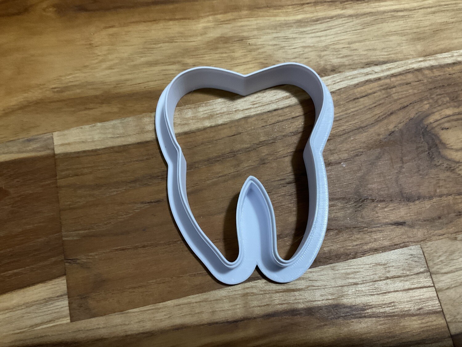 Tooth cutter