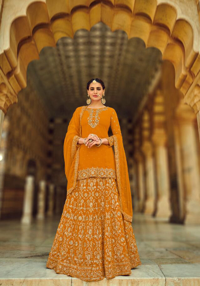 Embroidered Faux Georgette Lehenga Suit In Mustard Yellow