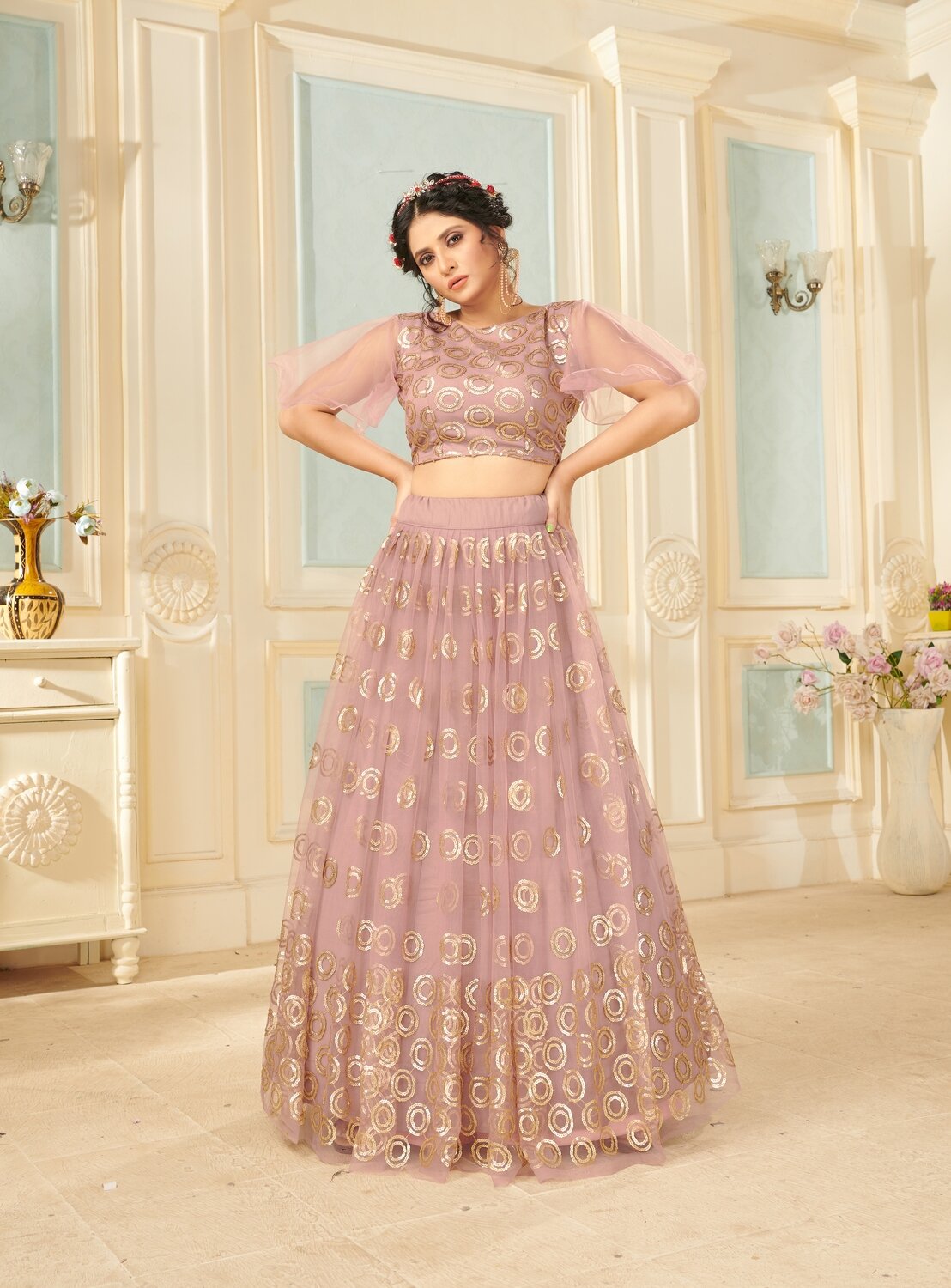 Gorgeous Wedding Wear Premium Soft Net Sequence Embroidered Lehenga Choli In Onion Pink