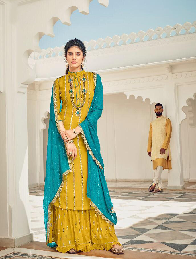 Party Wear Teal Blue Yellow Plazzo Suit In Faux Georgette With Heavy Embroidery