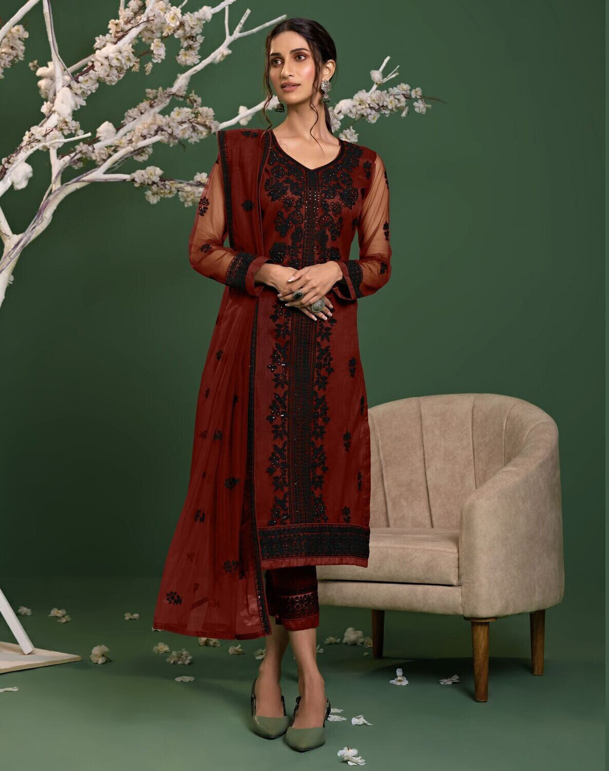 Sequence Embroidered Net Pakistani Suit In Maroon