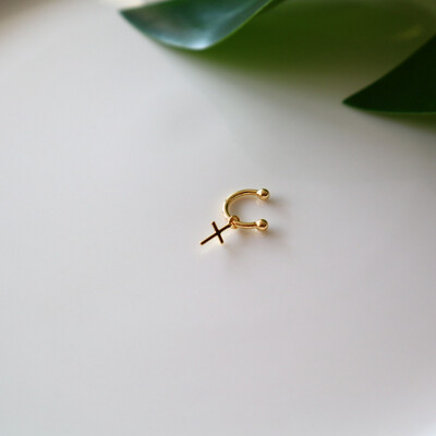 Piercing Crucifixo