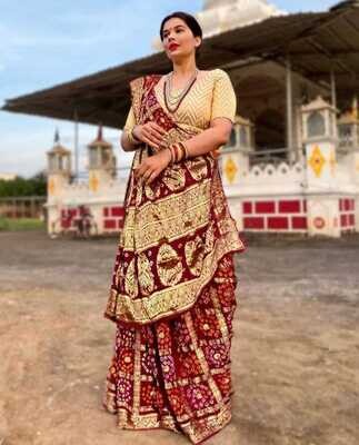 Maroon Color Bandhej Silk Saree With Zari Weaving Work