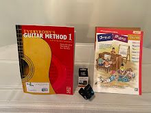 A music book and instrument tuner for an at-promise youth