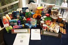 3 boxes including wellness items and shelf stable food for a family of four