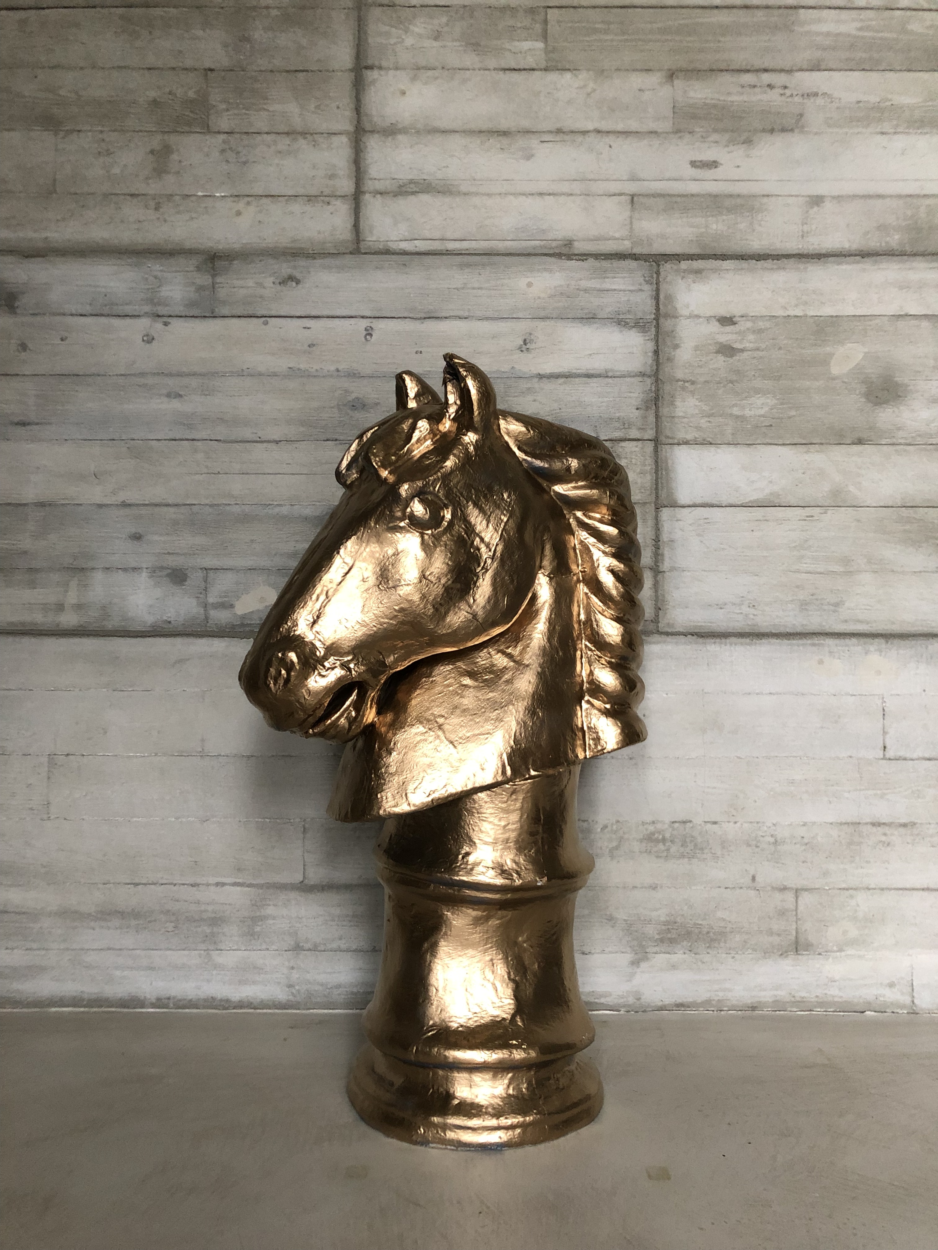 Big paper maché gold chess piece horse