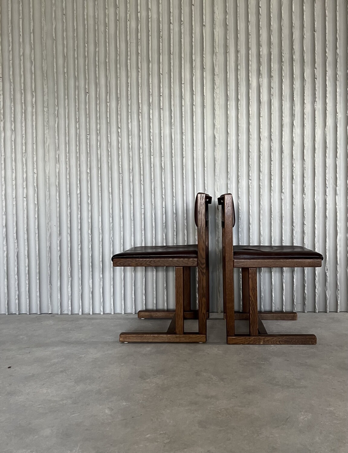 Architectural wood & leather chairs