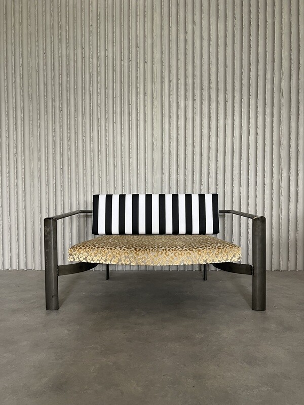 Funky meets rough! Steel loveseat with new upholstery