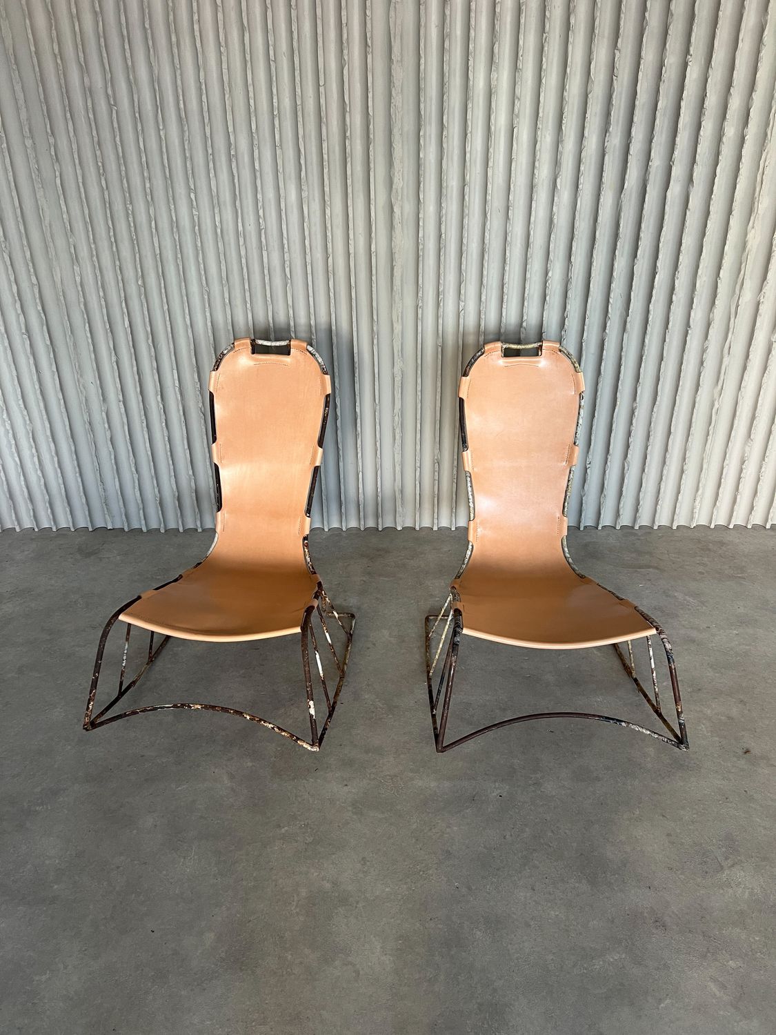 Set of Italian saddle leather rocking chairs