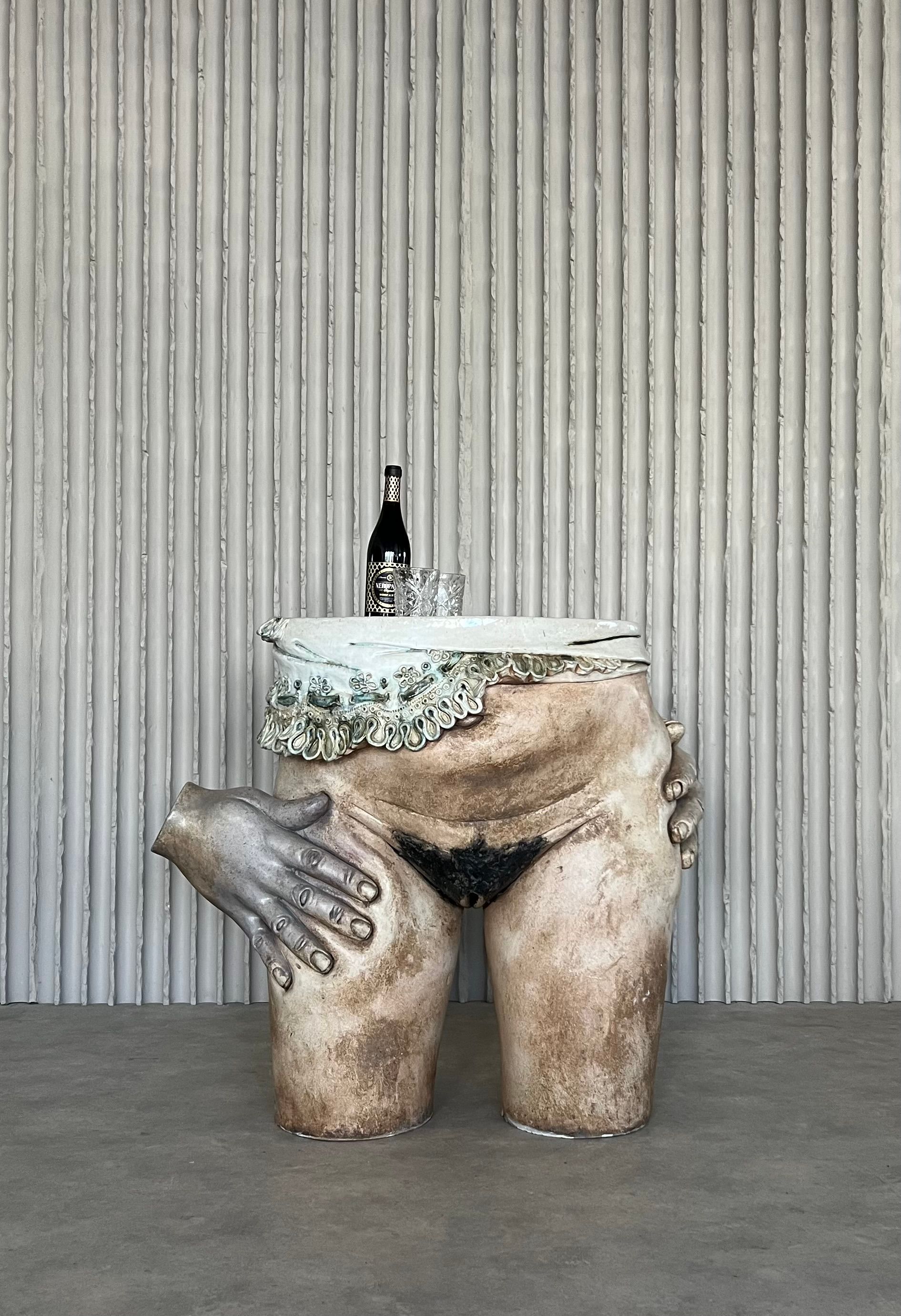 Very Large “nude” ceramic side table by Francis Hewlett