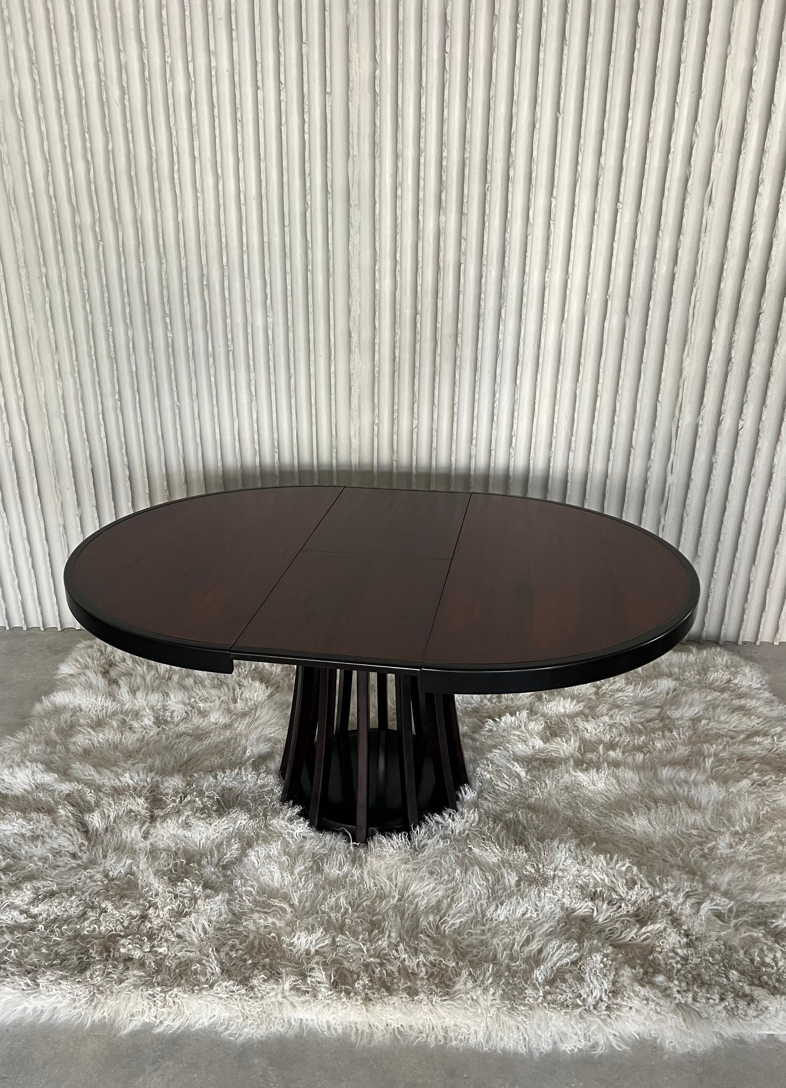 Extendable dining table by Angelo Mangiarotti