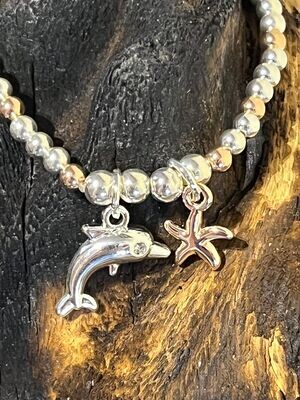 Dolphin and Starfish Rose and Silver Tone Stretch Bracelet