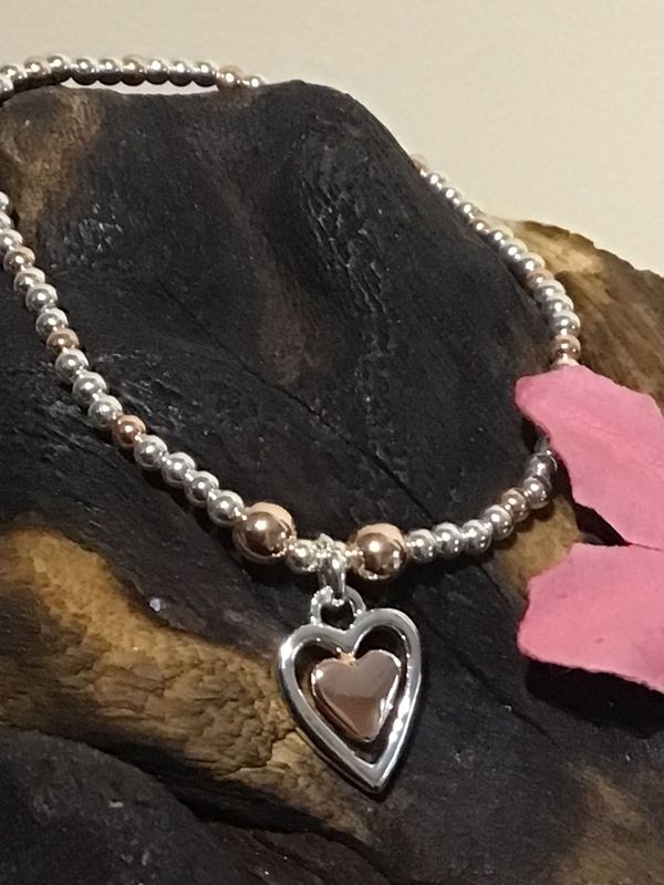 Silver and Rose Tone Heart Stretch Bracelet