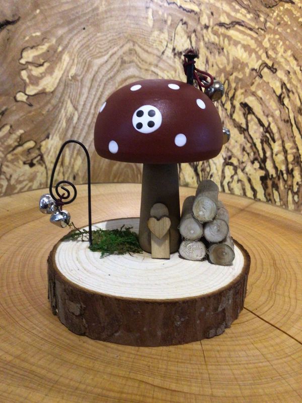 Brown Wooden Toadstool House on Log Slice