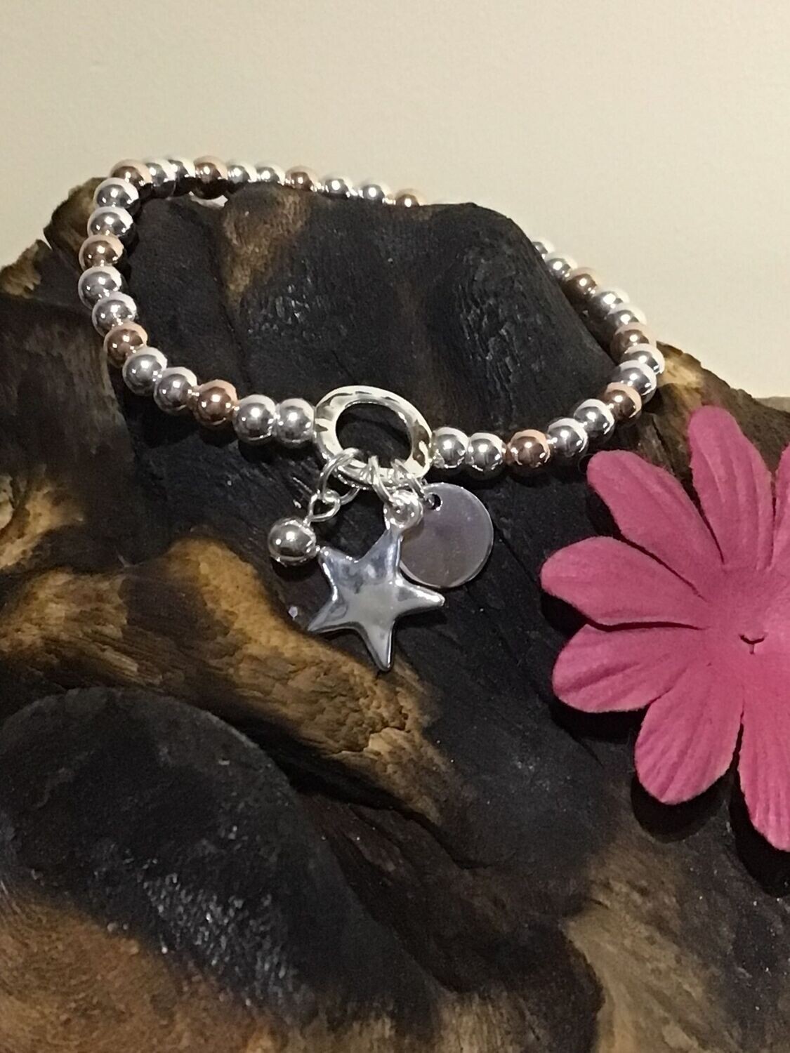 Star Silver and Rose Tone Stretch Bracelet Star Silver and Rose Tone Stretch Bracelet