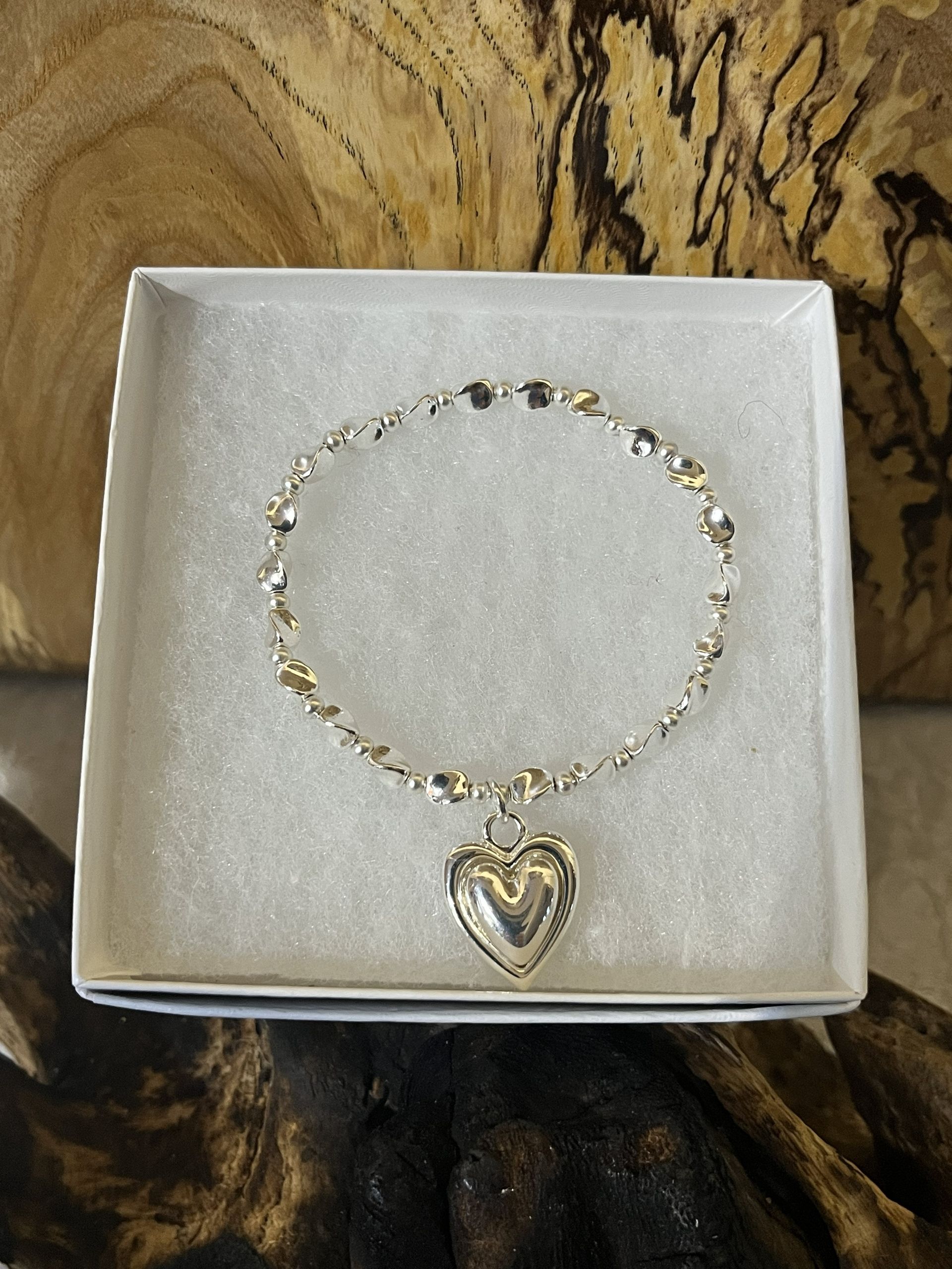 Silver Tone Puffed Heart Stretch Bracelet