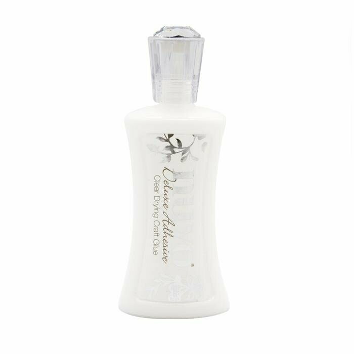 Nuvo Deluxe Adhesive