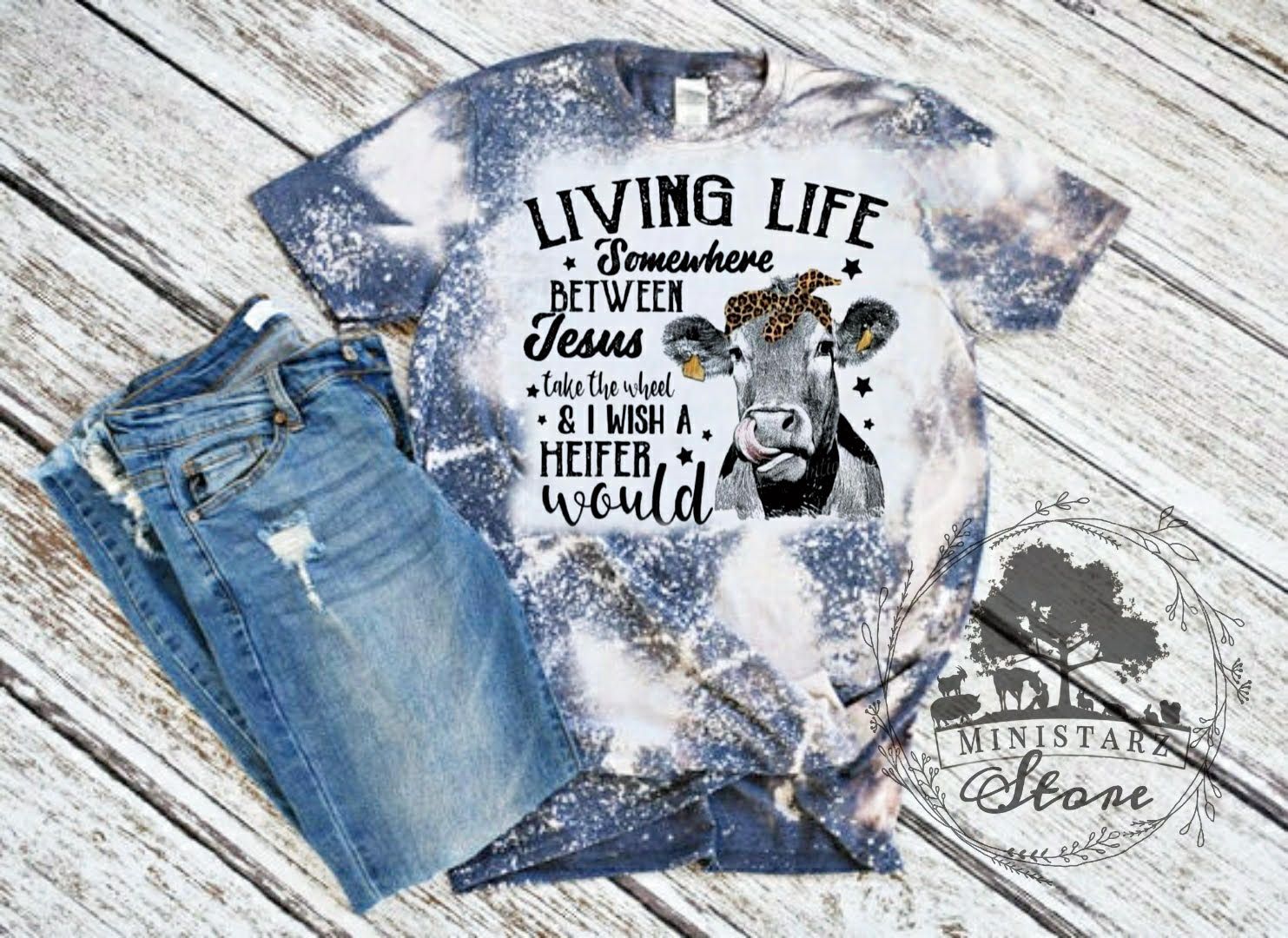 Living Life Somewhere Between Jesus Take The Wheel & I wish a Heifer Would Bleached Tee