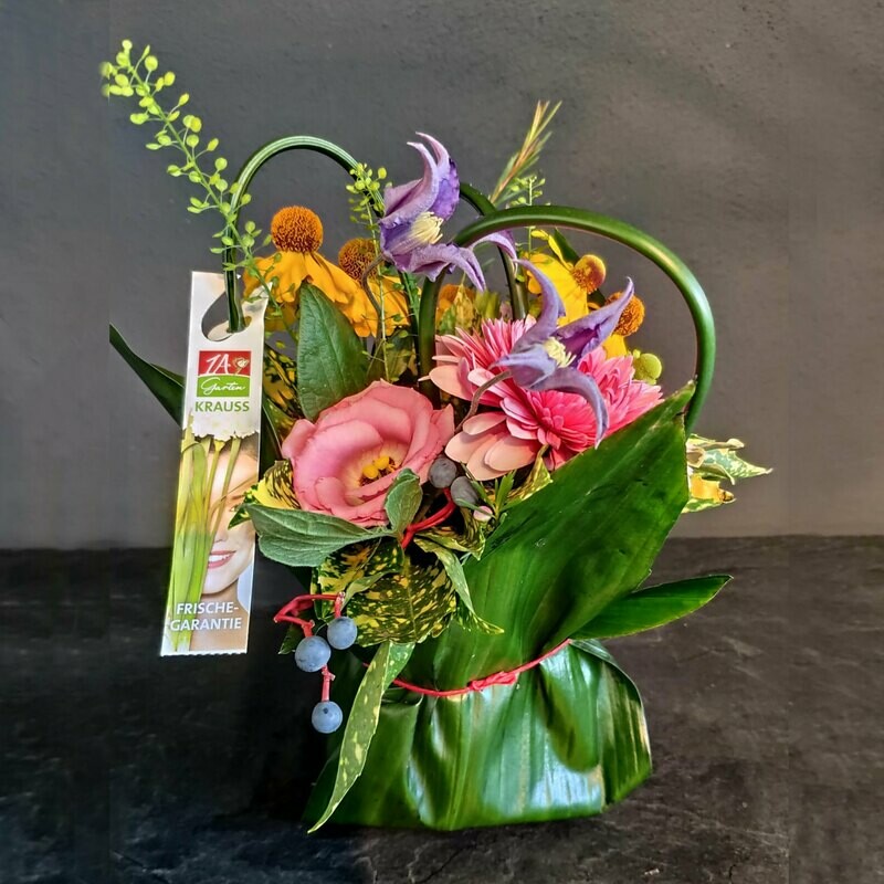 Blumengesteck in Aspi-Tasche