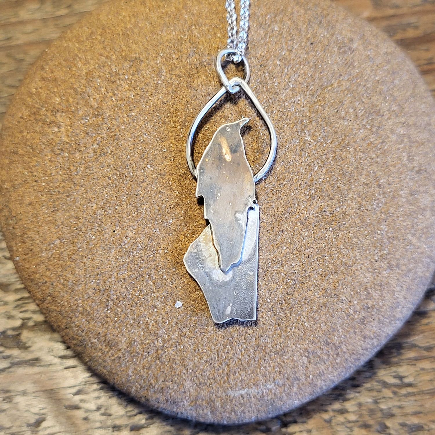 N1835 Crow on a Rocky Outcrop pendant