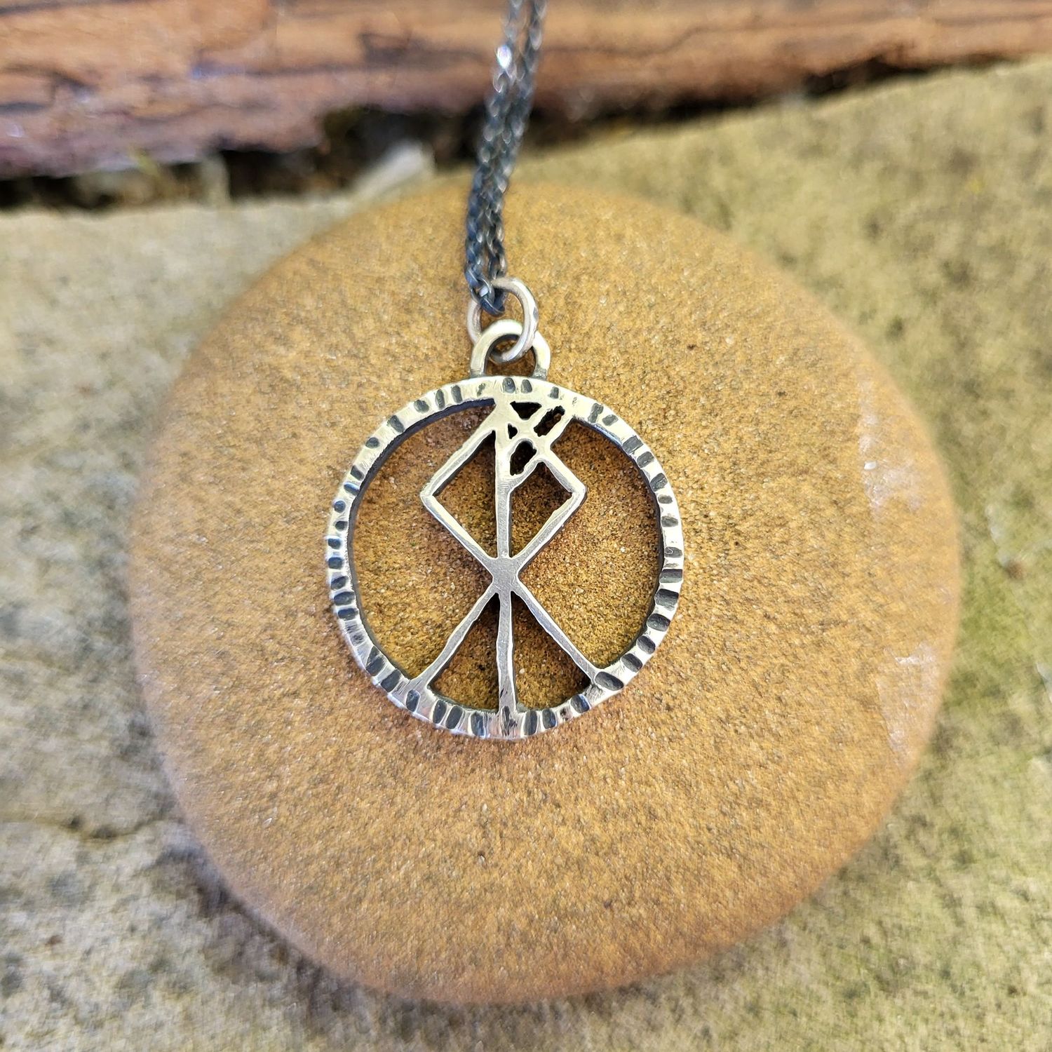 N1713 Pierced Wolf Rune pendant