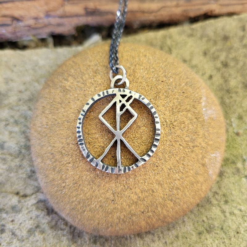N1713 Pierced Wolf Rune pendant
