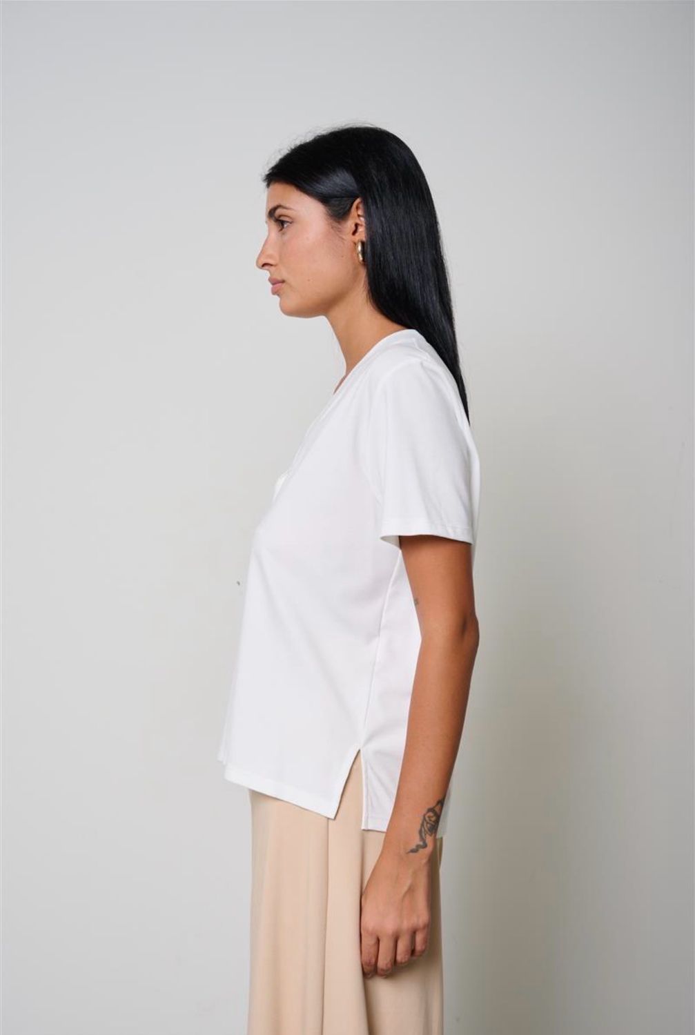 BLUSA KAOS DI JERSEY CON SCOLLO A V