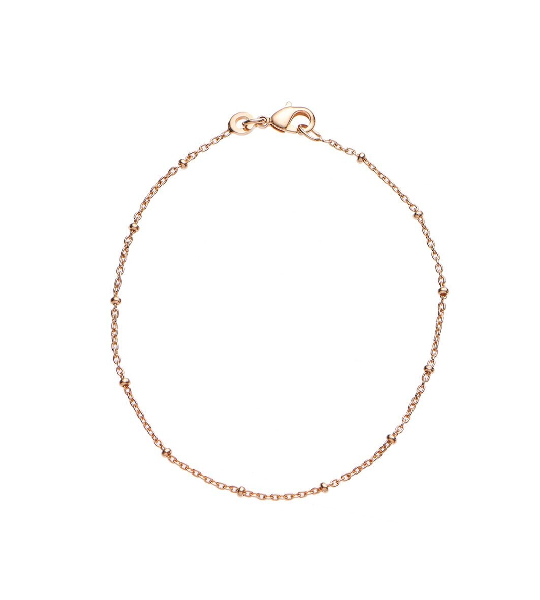 Goldarmkette mit integrierten Kügelchen