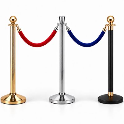 Gold, chrome and black-and-gold queue posts with red and blue velvet ropes