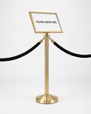 Side angle view of champagne gold A3 landscape sign holder on queue post showing 15° tilt