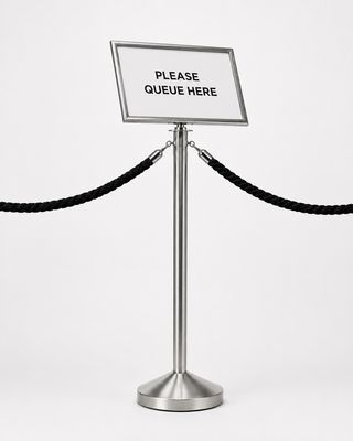 Chrome A3 15° angled landscape sign holder mounted on chrome queue stanchion