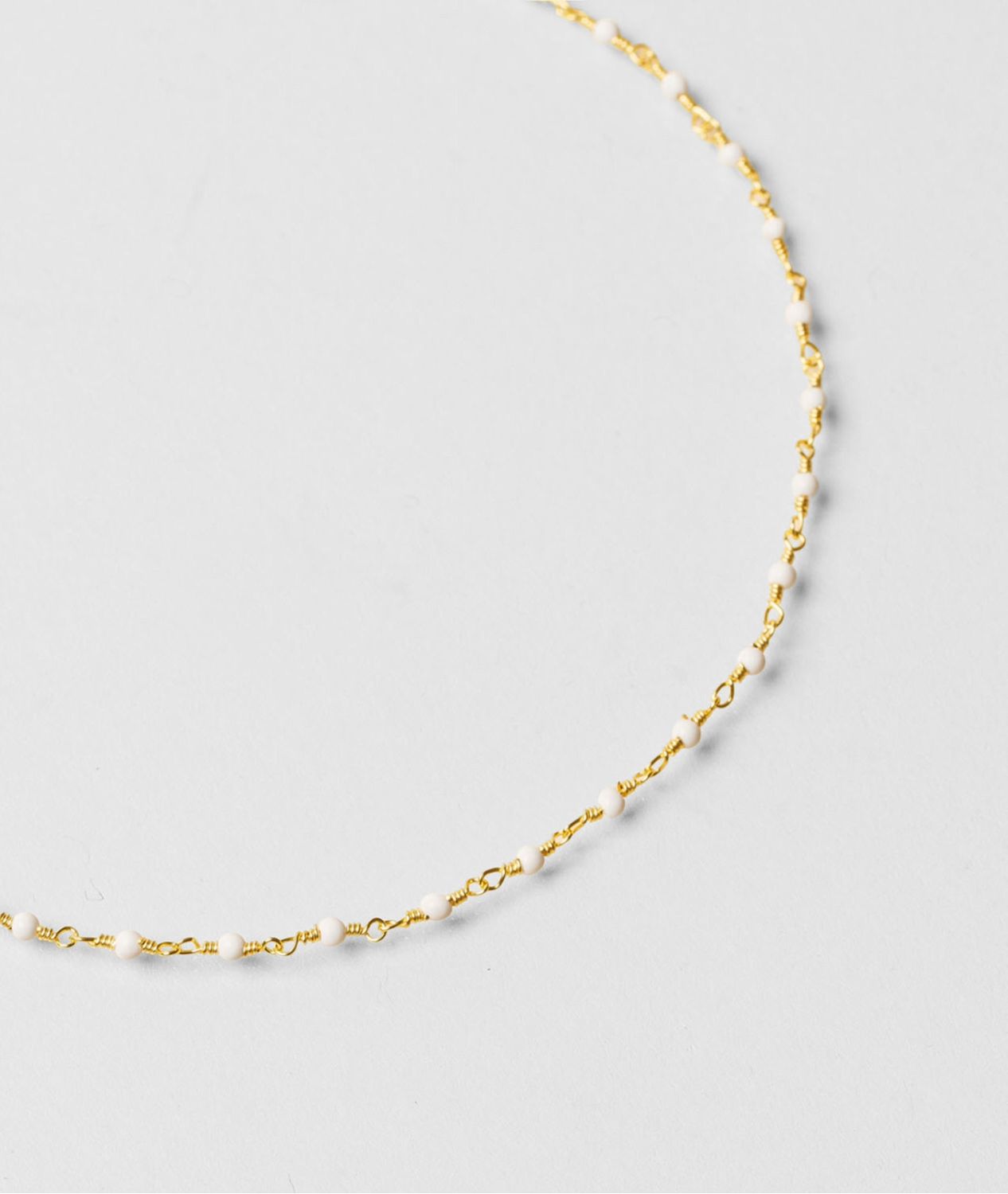 COLLIER &quot;UNE A UNE&quot;