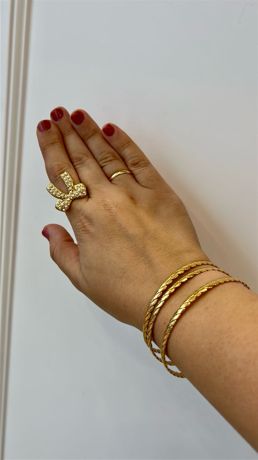 Anillo acero lazo y perlas