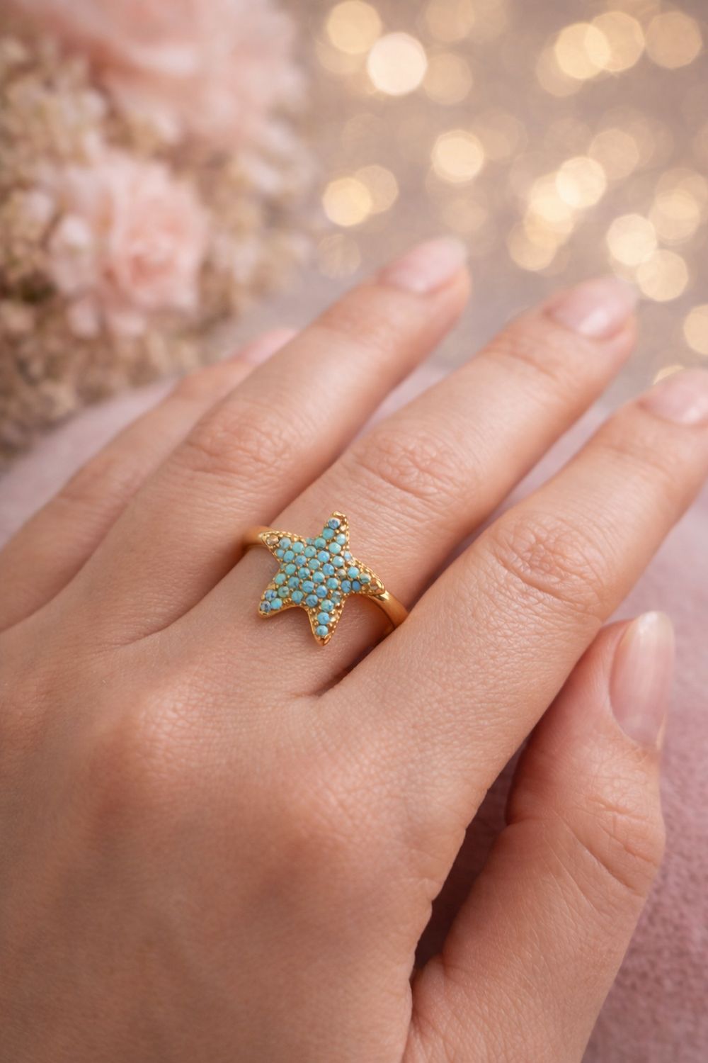 Anillo acero estrella de mar azul