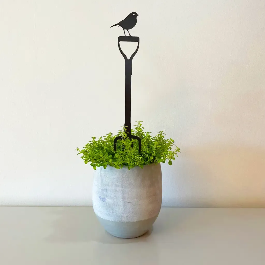 Robin Sitting On A Fork Pot Stem