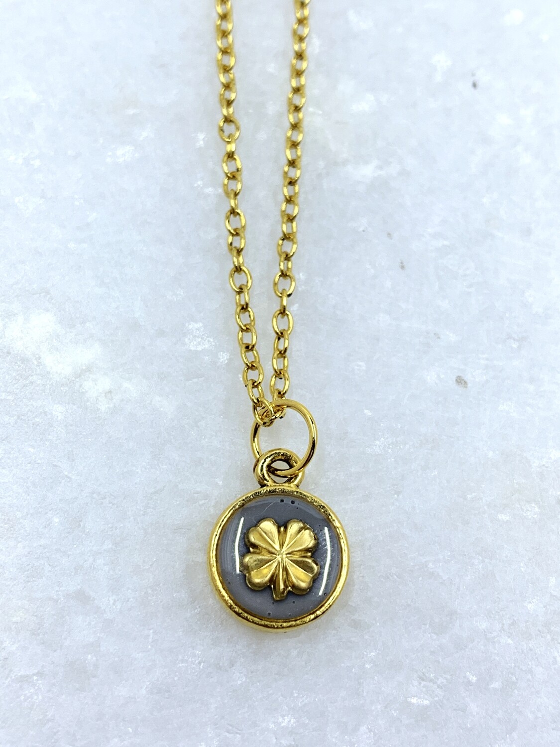 PEACE + PASSION JEWELRY  --  Small Circle Pendant  --  4 Leaf Clover Charm