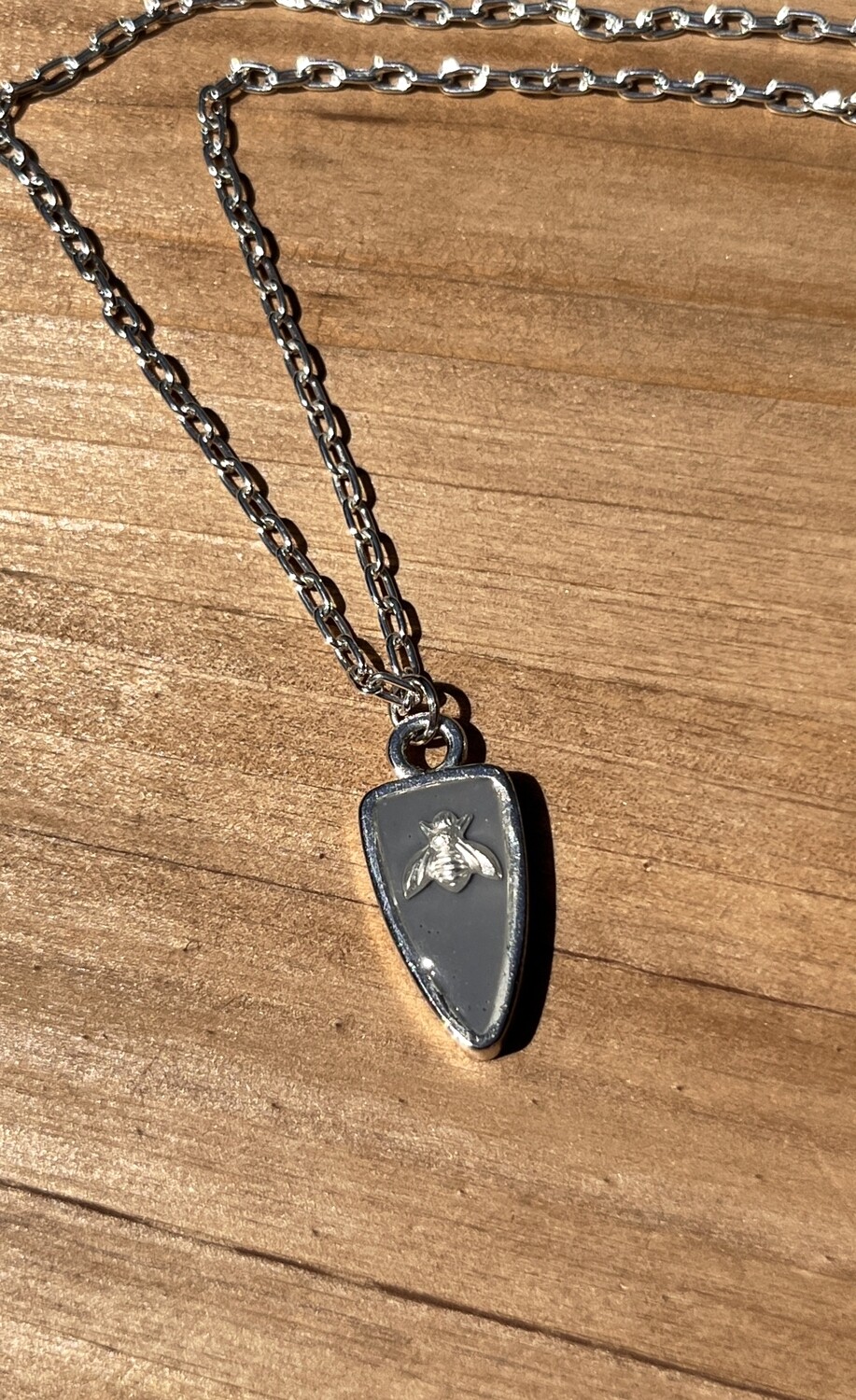 PEACE + PASSION JEWELRY  --  Arrowhead Pendant
--  Bee Charm