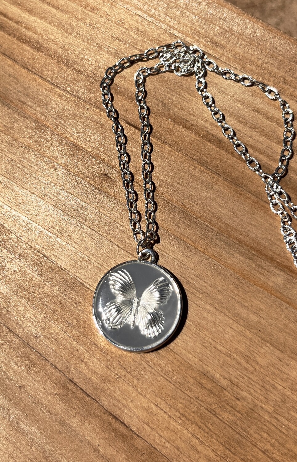 PEACE + PASSION JEWELRY  --  Large Circle Pendant
--  Butterfly charm