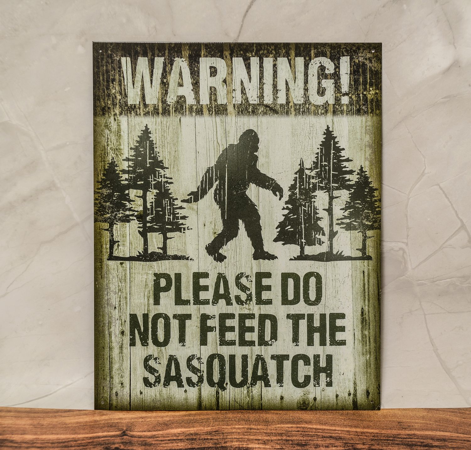 Green &quot;Please don&#39;t feed the sasquatch&quot; sign