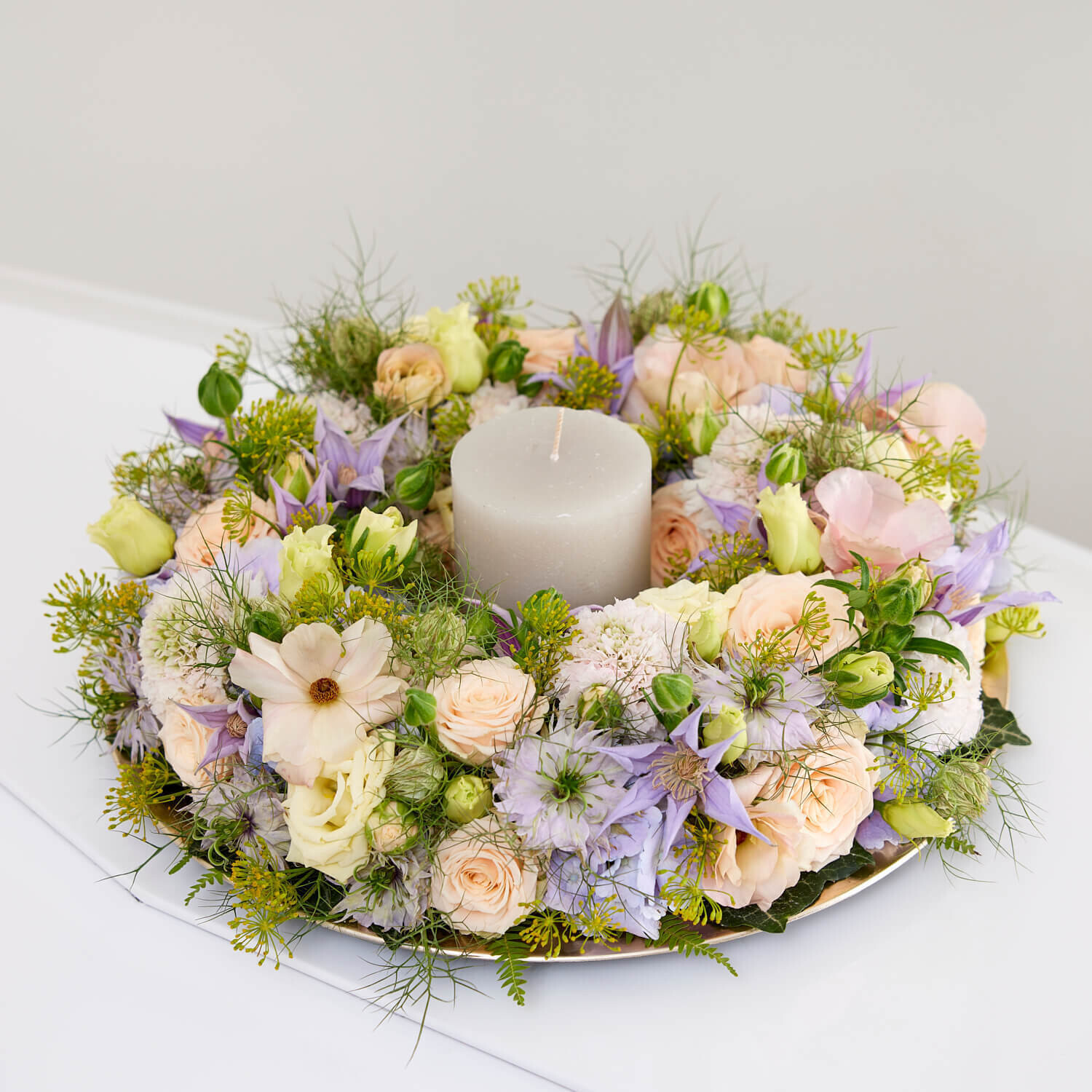 Troostkrans met kaars