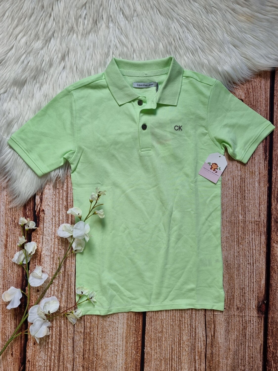 Camiseta verde, tipo polo, Calvin Klein, 5T y 7T
