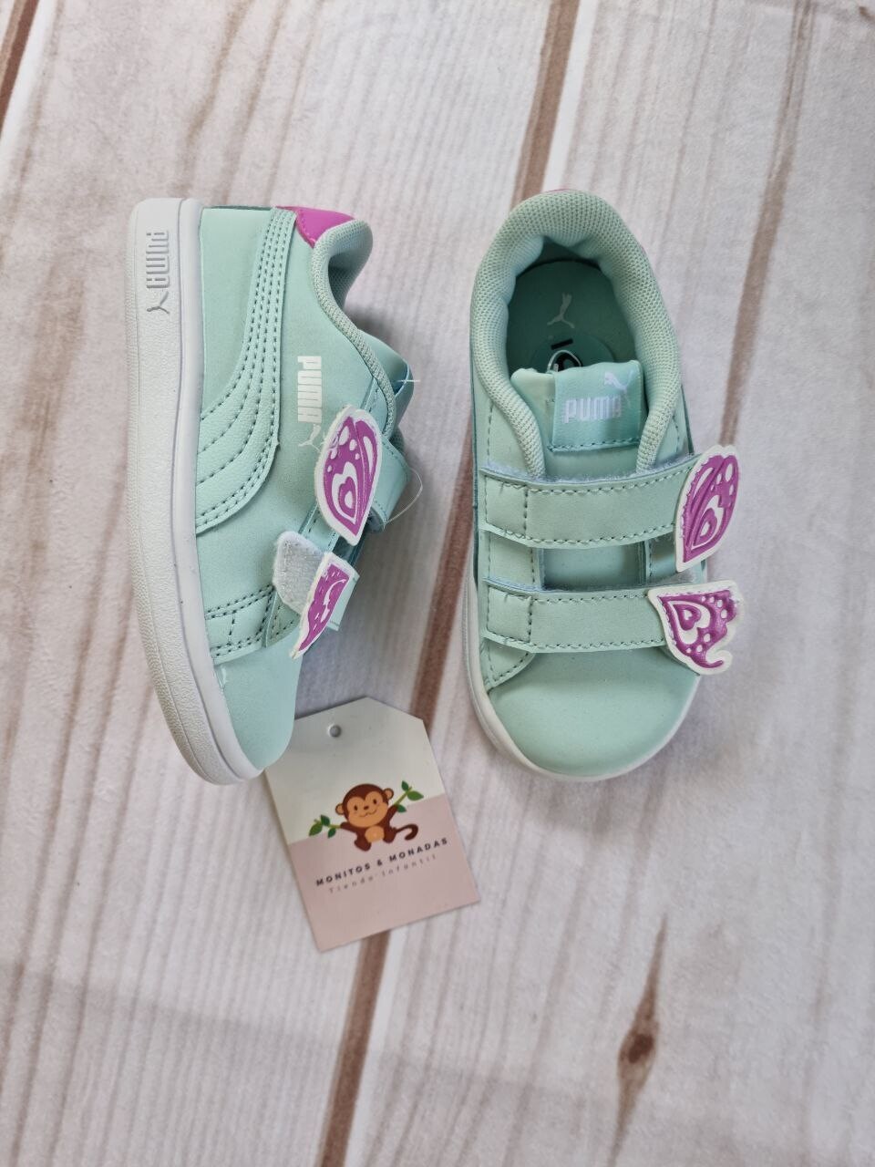 Zapatos celeste con detalle lila, talla 6us (22)