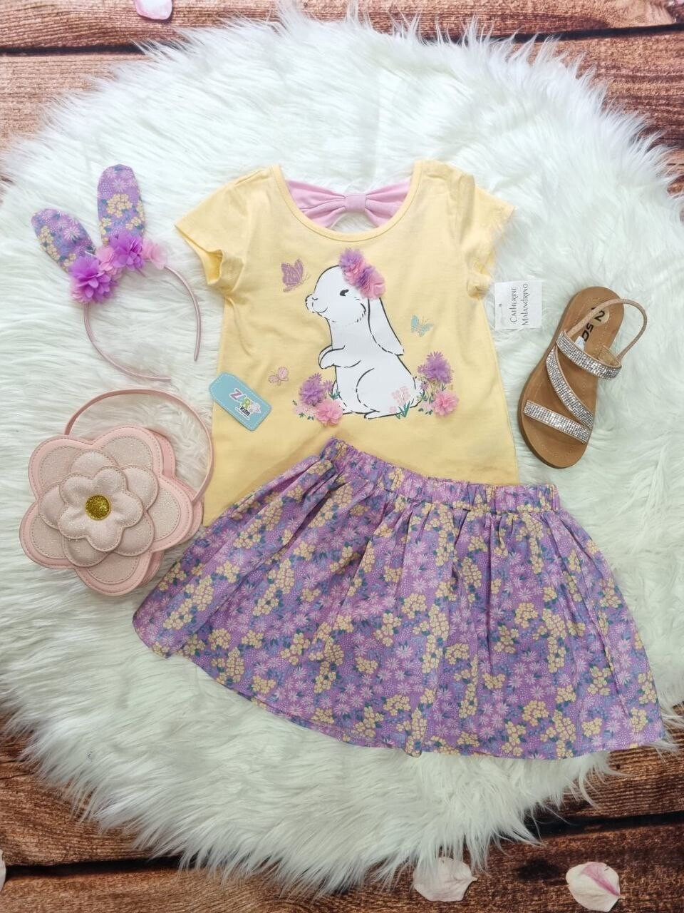 Set Catherine Malandrino, camiseta amarilla conejito + falda lila flores + diadema, 5/6 años