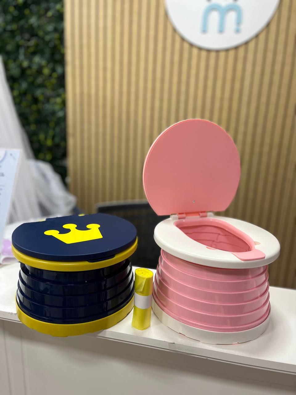 Inodoro portátil, rosa y azul