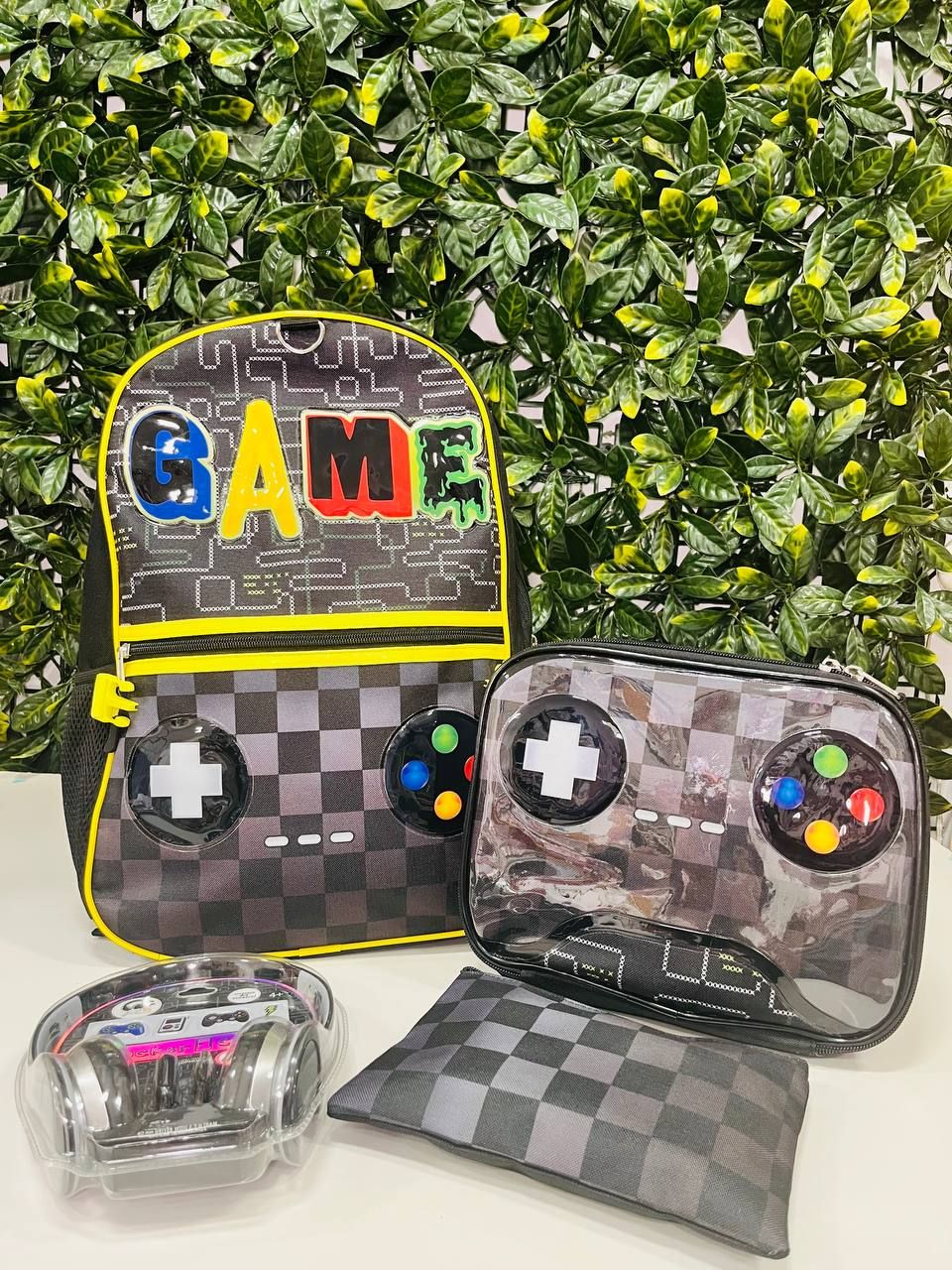 Mochila flores + lonchera + audífonos + cartuchera