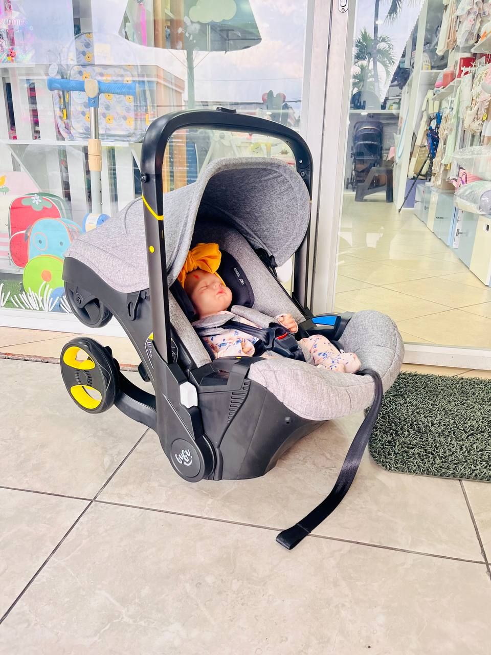 Cochecito y asiento de auto, Doona