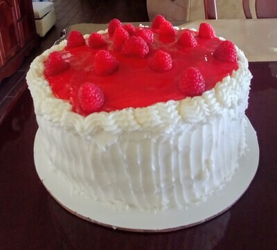 Vanilla Cake with Raspberry Filling and Vanilla Buttercream Frosting