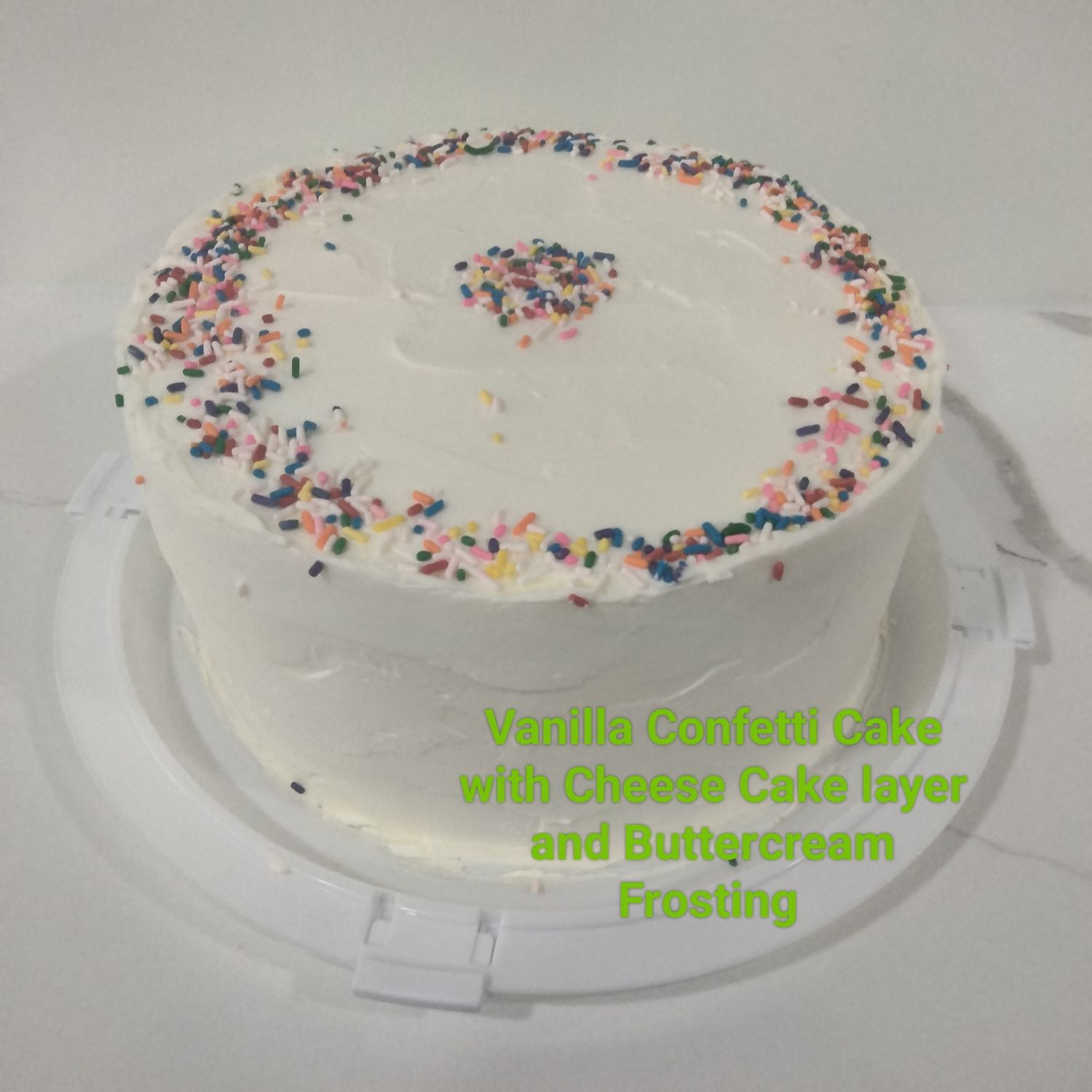 Vanilla Confetti Cake with Cheese Cake layer and Butter Cream Frosting