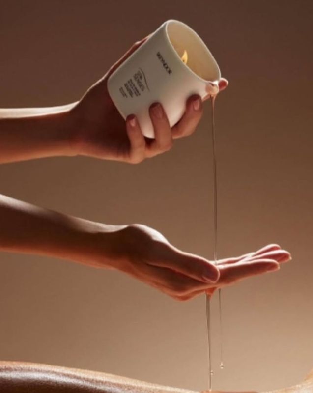 Massatge amb espelmes aromàtiques