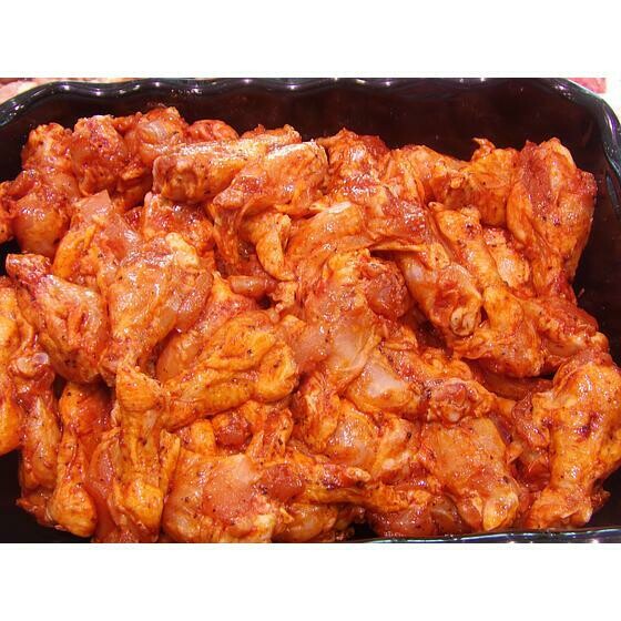 Manchon poulet mariné 12,90 €/kg Prix pour 100 g